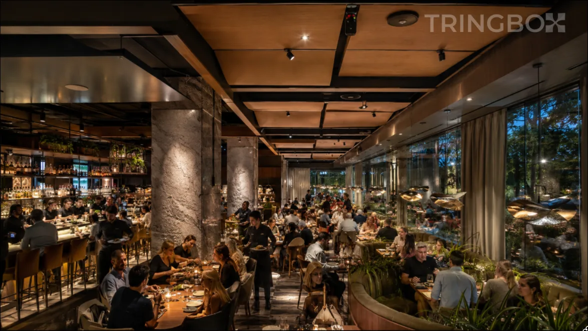 A bustling restaurant environment illustrating the complex interaction between background music, crowd noise, and architectural acoustics.